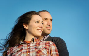 hopeful couple smiling during the COVID-19 outbreak | Reproductive Science Center of the San Francisco Bay Area