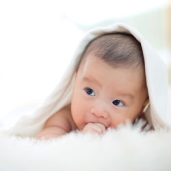 Are Birth Defects More Common in Babies Born from IVF? | RSC Bay Area | Baby wrapped in white blanket