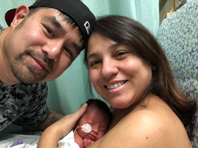 Diane with her husband and their newborn son she delivered with the help of egg donation | Reproductive Science Center of the SF Bay Area