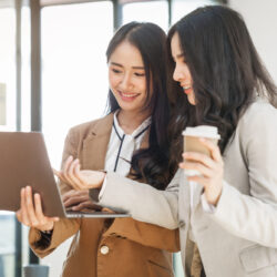 Two women researching growth hormone on a laptop | RSC of the SF Bay Area